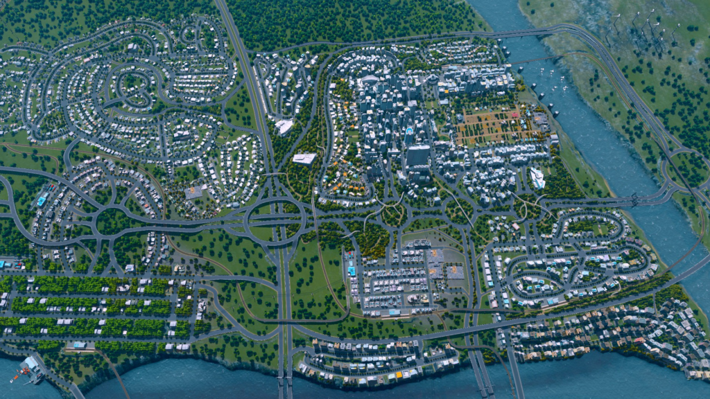 Visão ampla da cidade já desenvolvida em Cities: Skylines, com várias estradas, prédios e etc.