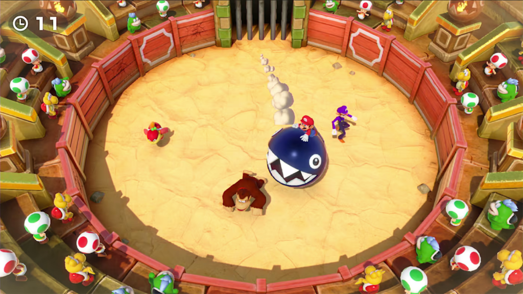 Jogadores no minigame do chain chomp em Super Mario Party